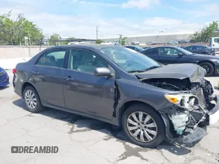 2013 Toyota Corolla L with VIN JTDBU4EE2DJ113876, listed as a IAAI auction lot 42044548 with 232,500 mi miles. Bid and sale history available at carsss.com. Image 1.