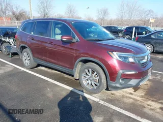 2021 Honda Pilot EX z VIN 5FNYF6H39MB093403, wystawiony jako IAAI lot #41350846 z przebiegiem 60 016 mil mil oraz . Historia ofert i sprzedaży dostępna na DreamBid. Obrazek 1.