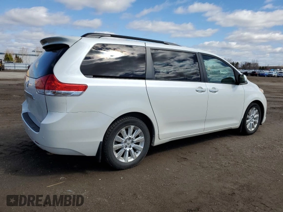 2012 Toyota Sienna XLE with VIN 5TDDK3DCXCS047104, listed as a Copart auction lot 53521335 with 184,269 mi miles and Clean Title. Bid and sale history available at DreamBid. Image 3.