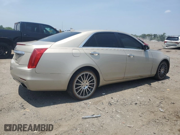 2014 Cadillac CTS Luxury AWD z VIN 1G6AX5SX8E0145837, wystawiony jako Copart lot #60682455 z przebiegiem 152 135 mil mil oraz Czysty tytuł • Clean title. Historia ofert i sprzedaży dostępna na DreamBid. Obrazek 3.