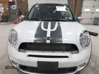 2012 MINI Countryman S with VIN WMWZC5C58CWL60067, listed as a IAAI auction lot 42081725 with 104,397 mi miles and . Bid and sale history available at DreamBid. Image 6.