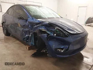 2023 Tesla Model Y Performance z VIN 7SAYGDEF1PF970697, wystawiony jako IAAI lot #41379960 z przebiegiem 23 121 mil mil oraz . Historia ofert i sprzedaży dostępna na DreamBid. Obrazek 1.