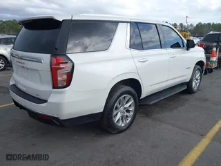 2021 Chevrolet Tahoe LT with VIN 1GNSCNKD4MR234034, listed as a IAAI auction lot 41727298 with 75,039 mi miles. Bid and sale history available at carsss.com. Image 4.
