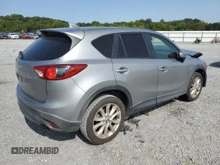 2015 Mazda CX-5 Grand Touring with VIN JM3KE4DY8F0540181, listed as a Copart auction lot 70624394 with 119,420 mi miles and Salvage Title. Bid and sale history available at carsss.com. Image 3.