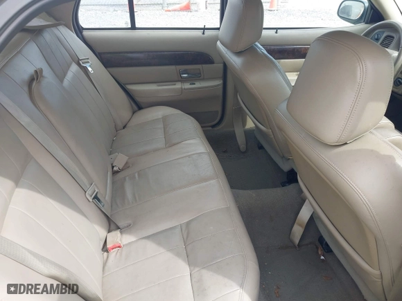 2005 Mercury Grand Marquis LS Premium with VIN 2MEFM75W35X654244, listed as a IAAI auction lot 42090783 with 120,033 mi miles. Bid and sale history available at carsss.com. Image 8.