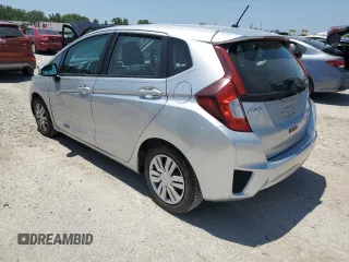 2015 Honda Fit LX z VIN 3HGGK5H52FM738587, wystawiony jako Copart lot #61231705 z przebiegiem 134 623 mil mil oraz Szkoda całkowita • Salvage title. Historia ofert i sprzedaży dostępna na DreamBid. Obrazek 2.