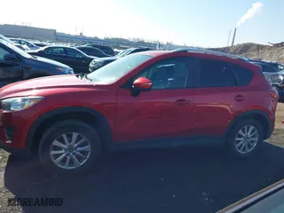 2016 Mazda CX-5 Touring with VIN JM3KE4CY0G0901356, listed as a IAAI auction lot 41641742 with 96,950 mi miles. Bid and sale history available at carsss.com. Image 14.