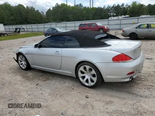 2006 BMW 6 Series 650Ci z VIN WBAEK13406CN75613, wystawiony jako Copart lot #56288515 z przebiegiem 191 640 mil mil oraz Szkody całkowita. Historia ofert i sprzedaży dostępna na DreamBid. Obrazek 2.