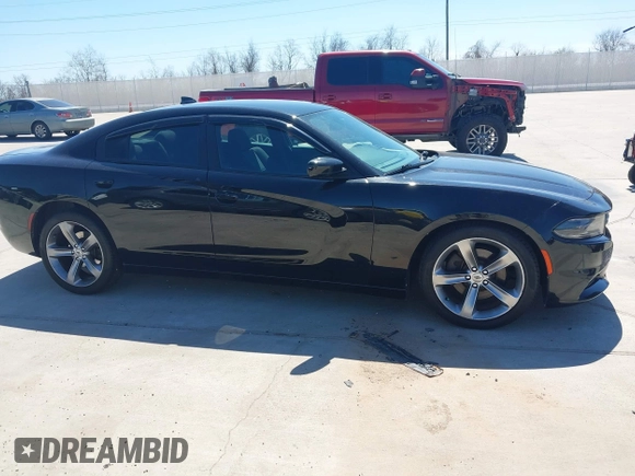 2018 Dodge Charger R/T with VIN 2C3CDXCT9JH128853, listed as a IAAI auction lot 41771706 with 54,962 mi miles and . Bid and sale history available at carsss.com. Image 13.