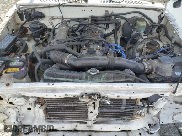 1994 Toyota Pickup z VIN JT4RN81A1R5193791, wystawiony jako Copart lot #48168055 z przebiegiem 22 108 mil mil oraz Szkoda całkowita • Salvage title. Historia ofert i sprzedaży dostępna na DreamBid. Obrazek 11.