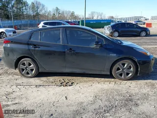 2019 Toyota Prius L Eco with VIN JTDKARFU9K3091887, listed as a IAAI auction lot 41282017 with 240,000 mi miles. Bid and sale history available at carsss.com. Image 13.