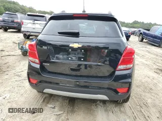2021 Chevrolet Trax LT with VIN KL7CJLSB4MB324912, listed as a Copart auction lot 66497224 with 59,619 mi miles and Salvage title. Bid and sale history available at DreamBid. Image 6.