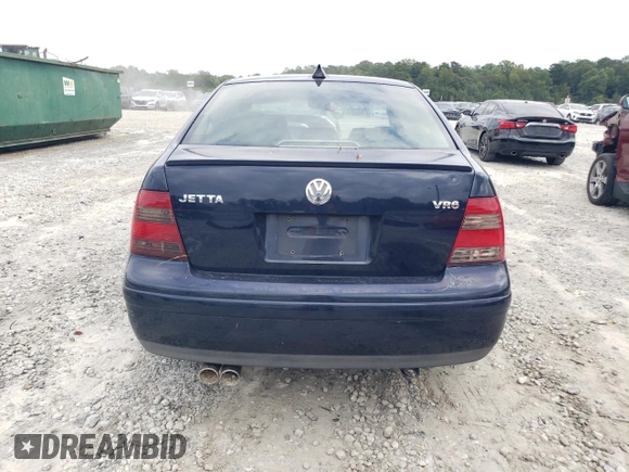 2000 Volkswagen Jetta with VIN 3VWSE29M7YM028198, listed as a Copart auction lot 73648504 with 265,184 mi miles and Salvage title. Bid and sale history available at DreamBid. Image 6.