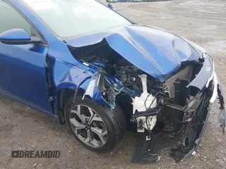 2019 Kia Forte LXS with VIN 3KPF24AD0KE049626, listed as a IAAI auction lot 42018286 with 141,619 mi miles and . Bid and sale history available at DreamBid. Image 6.