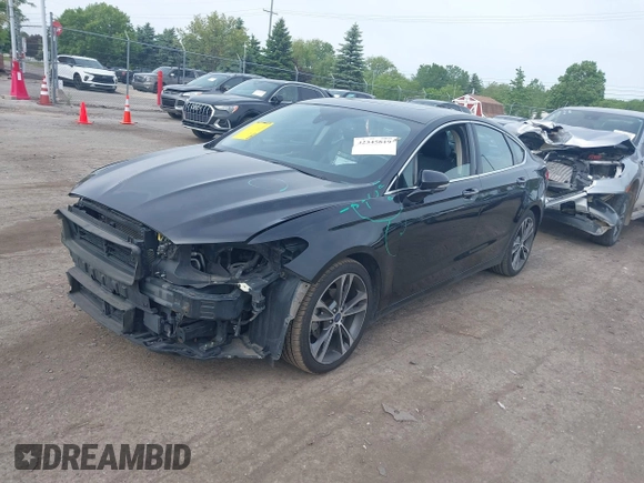 2020 Ford Fusion Titanium with VIN 3FA6P0K94LR117138, listed as a IAAI auction lot 42345819 with 88,117 mi miles and . Bid and sale history available at DreamBid. Image 2.