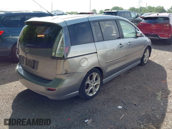 2010 Mazda 5 Sport with VIN JM1CR2W31A0384307, listed as a IAAI auction lot 42305589 with 144,372 mi miles and . Bid and sale history available at DreamBid. Image 4.