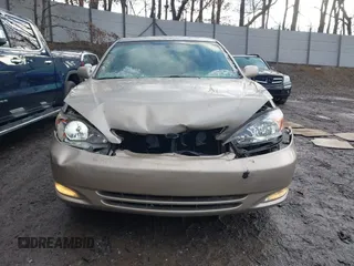 2003 Toyota Camry LE with VIN 4T1BE30K13U705105, listed as a IAAI auction lot 41696395 with 191,389 mi miles and . Bid and sale history available at DreamBid. Image 12.