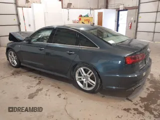 2016 Audi A6 2.0T Premium Plus with VIN WAUGFAFC8GN088505, listed as a IAAI auction lot 41569043 with 98,528 mi miles. Bid and sale history available at carsss.com. Image 3.