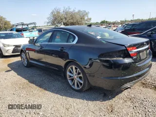 2015 Jaguar XF V6 Portfolio with VIN SAJWJ0FFXF8U60040, listed as a Copart auction lot 52912695 with 112,618 mi miles and Salvage Title. Bid and sale history available at carsss.com. Image 2.