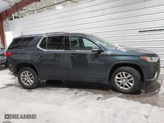 2019 Chevrolet Traverse LT Cloth with VIN 1GNEVGKW7KJ111442, listed as a IAAI auction lot 41356321 with 153,940 mi miles. Bid and sale history available at carsss.com. Image 14.