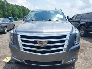 2020 Cadillac Escalade Luxury z VIN 1GYS3BKJ0LR116410, wystawiony jako IAAI lot #42274841 z przebiegiem 75 513 mil mil oraz . Historia ofert i sprzedaży dostępna na DreamBid. Obrazek 12.