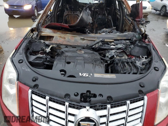 2014 Cadillac SRX with VIN 3GYFNAE37ES519285, listed as a Copart auction lot 83986834 with Not Provided miles and Salvage Title. Bid and sale history available at DreamBid. Image 11.