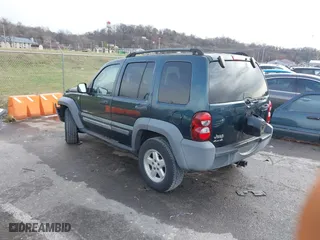 2005 Jeep Liberty Sport with VIN 1J4GL48K15W631101, listed as a IAAI auction lot 41217588 with 168,378 mi miles. Bid and sale history available at carsss.com. Image 3.