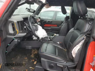 2021 Ford Bronco z VIN 1FMDE5CH3MLA60288, wystawiony jako Copart lot #79826644 z przebiegiem 12 451 mil mil oraz Szkoda całkowita • Salvage title. Historia ofert i sprzedaży dostępna na DreamBid. Obrazek 7.
