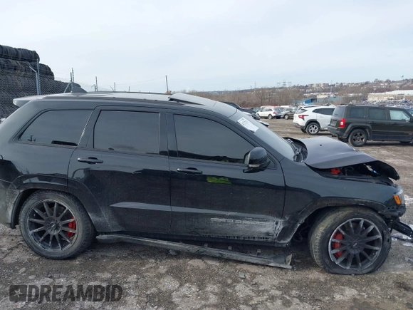 2017 Jeep Grand Cherokee SRT with VIN 1C4RJFDJ7HC641926, listed as a IAAI auction lot 41272215 with 117,667 mi miles. Bid and sale history available at carsss.com. Image 12.