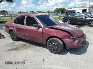 1998 Toyota Corolla VE with VIN 1NXBR12E5WZ041539, listed as a Copart auction lot 61736825 with Not provided miles and Salvage title. Bid and sale history available at DreamBid. Image 4.