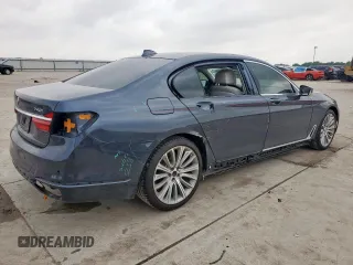 2018 BMW 7 Series 740i z VIN WBA7E2C50JG741970, wystawiony jako Copart lot #56480695 z przebiegiem 53 740 mil mil oraz Szkoda całkowita • Salvage title. Historia ofert i sprzedaży dostępna na DreamBid. Obrazek 3.