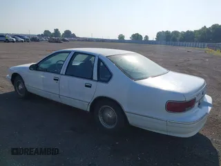 1995 Chevrolet Caprice z VIN 1G1BL52W0SR183101, wystawiony jako IAAI lot #42471866 z przebiegiem 158 647 mil mil oraz . Historia ofert i sprzedaży dostępna na DreamBid. Obrazek 3.