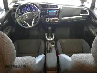 2016 Honda Fit LX with VIN JHMGK5H50GX005947, listed as a Copart auction lot 57699275 with 103,698 mi miles and Salvage title. Bid and sale history available at DreamBid. Image 8.