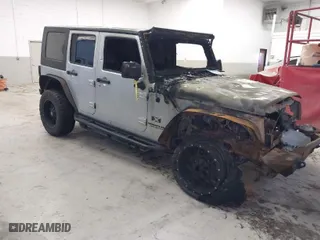 2009 Jeep Wrangler Unlimited X with VIN 1J4GA39159L763484, listed as a IAAI auction lot 40761006 with 1 mi miles. Bid and sale history available at carsss.com. Image 1.