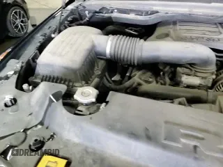 2019 Ram 1500 Rebel z VIN 1C6SRFET7KN746866, wystawiony jako Copart lot #70141445 z przebiegiem 67 389 mil mil oraz Szkoda całkowita • Salvage title. Historia ofert i sprzedaży dostępna na DreamBid. Obrazek 15.