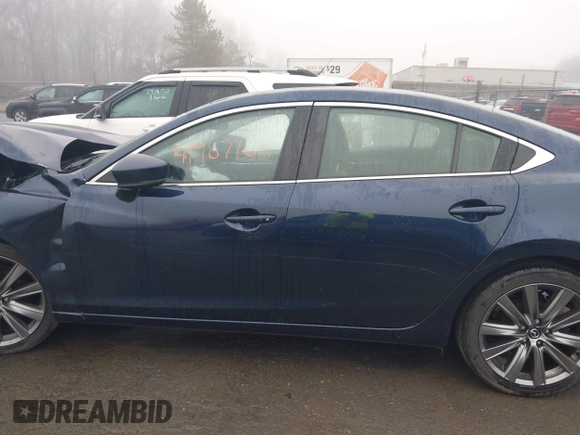 2021 Mazda 6 Touring with VIN JM1GL1VM4M1616243, listed as a IAAI auction lot 41907100 with 59,315 mi miles and . Bid and sale history available at carsss.com. Image 14.