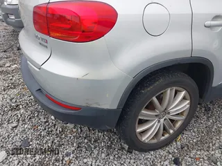 2012 Volkswagen Tiguan S z VIN WVGBV7AX3CW540311, wystawiony jako IAAI lot #42375250 z przebiegiem 168 594 mil mil oraz . Historia ofert i sprzedaży dostępna na DreamBid. Obrazek 12.