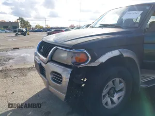 2001 Mitsubishi Montero Sport XLS with VIN JA4LS31HX1P005173, listed as a IAAI auction lot 40979545 with 147,168 mi miles. Bid and sale history available at carsss.com. Image 6.