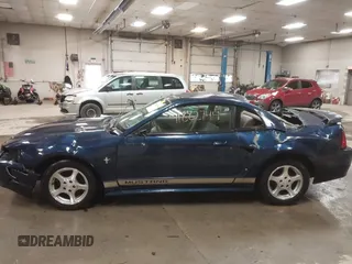 2002 Ford Mustang Standard z VIN 1FAFP40452F117630, wystawiony jako IAAI lot #41882744 z przebiegiem 85 218 mil mil oraz . Historia ofert i sprzedaży dostępna na DreamBid. Obrazek 15.