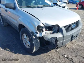 2007 Ford Escape XLS with VIN 1FMYU92Z87KA05657, listed as a IAAI auction lot 41723701 with 152,713 mi miles. Bid and sale history available at carsss.com. Image 6.