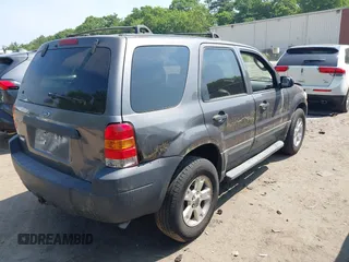 2005 Ford Escape XLT with VIN 1FMYU93155KA87661, listed as a IAAI auction lot 42491447 with 142,287 mi miles and . Bid and sale history available at DreamBid. Image 4.
