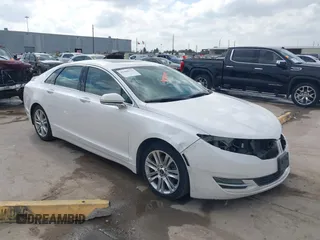2016 Lincoln MKZ z VIN 3LN6L2GK0GR630062, wystawiony jako IAAI lot #41488123 z przebiegiem 66 630 mil mil oraz . Historia ofert i sprzedaży dostępna na DreamBid. Obrazek 1.