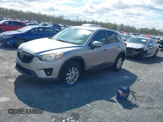 2013 Mazda CX-5 Touring with VIN JM3KE4CE5D0125470, listed as a IAAI auction lot 42051475 with 277,077 mi miles. Bid and sale history available at carsss.com. Image 2.