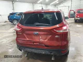 2013 Ford Escape SE with VIN 1FMCU9GX1DUC56361, listed as a IAAI auction lot 42042233 with 136,441 mi miles and . Bid and sale history available at DreamBid. Image 16.