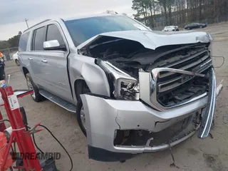 2019 GMC Yukon XL SLT with VIN 1GKS1GKC8KR383694, listed as a IAAI auction lot 41466213 with 128,368 mi miles. Bid and sale history available at carsss.com. Image 1.