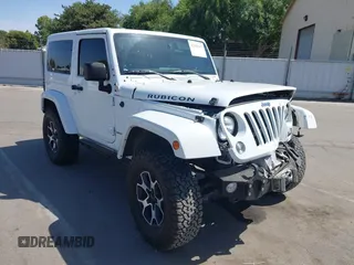 2014 Jeep Wrangler Rubicon with VIN 1C4BJWCGXEL220575, listed as a IAAI auction lot 42355917 with 94,286 mi miles and . Bid and sale history available at DreamBid. Image 1.