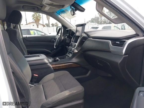 2016 Chevrolet Tahoe LS with VIN 1GNSCAKC1GR139869, listed as a IAAI auction lot 41642073 with 128,380 mi miles. Bid and sale history available at carsss.com. Image 5.