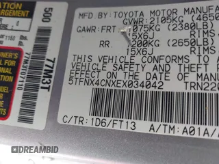 2014 Toyota Tacoma with VIN 5TFNX4CNXEX034042, listed as a IAAI auction lot 42059180 with 108,031 mi miles and . Bid and sale history available at DreamBid. Image 9.