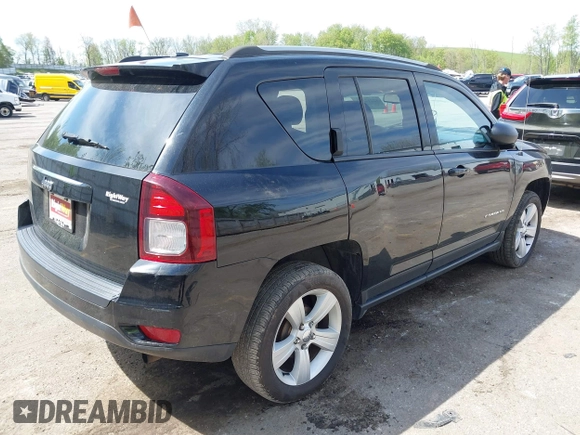 2016 Jeep Compass Sport with VIN 1C4NJCBA2GD641289, listed as a IAAI auction lot 42212542 with 121,447 mi miles and . Bid and sale history available at DreamBid. Image 4.