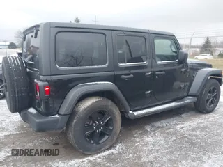 2023 Jeep Wrangler Sport S with VIN 1C4HJXDG8PW653828, listed as a IAAI auction lot 41239974 with 16,076 mi miles and . Bid and sale history available at DreamBid. Image 4.